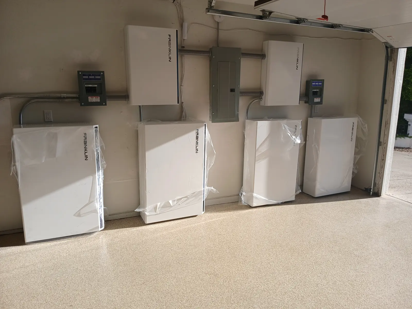 BlueWest Electric Franklin battery bank installed in a garage